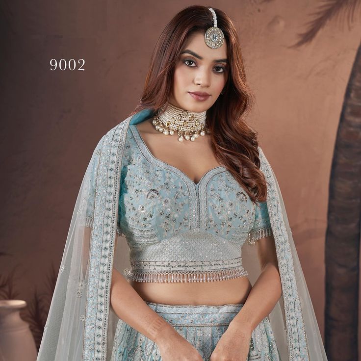 Draped yourself in emerald dreams, our sky blue lehenga is an artistry, adorned with intricate hand work and playful tassels dancing on the beautiful dupatta. SHOP NOW 🛍️ gotifab.com (Sky lehenga choli, lehenga choli for women, party wear lehenga choli, chantys choli, made to measure lefenga choli] #whitelehnga #lehengacholionline #gotifab #lehengablouses #lenghacholi #bollywoodstylelehenga #nycinfluencer #indianweddinglehengas Sky Lehenga, Sky Blue Lehenga, Beautiful Dupatta, Lehenga Choli For Women, Choli For Women, Party Wear Lehenga Choli, Lengha Choli, Blue Lehenga, Lehenga Choli Online