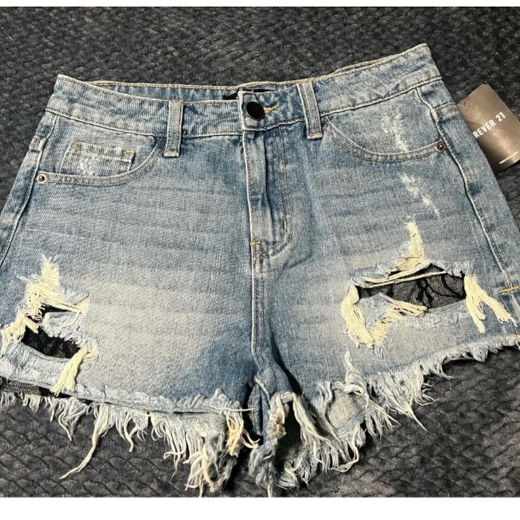 Size Small Distressed Shorts 2.5 “ Inseam Rise 11” Forever 21 High Waist Ripped Bottoms, Forever 21 Ripped Summer Bottoms, Forever 21 Ripped High Rise Bottoms, Forever 21 High Rise Ripped Bottoms, Trendy Ripped Bottoms From Forever 21, Forever 21 Distressed Denim Bottoms, Trendy Distressed Bottoms From Forever 21, Casual Distressed Bottoms By Forever 21, Trendy Distressed Forever 21 Bottoms