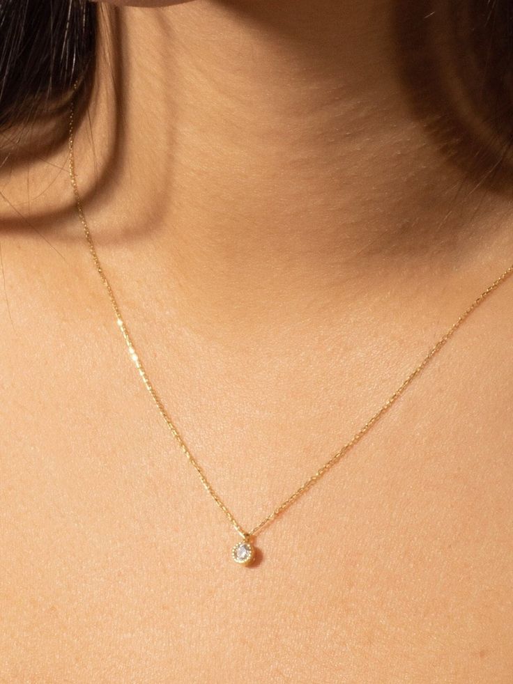 "This solitaire diamond necklace is made of 14k Solid Yellow Gold and round cut solitaire zircon stone. A dainty minimalist gold jewelry and cool piece combining perfect with daily outfits and a perfect gift for her :)  We can produce it in 14k Solid Yellow Gold, 14k White Gold or in 14k Solid Rose Gold, please choose from options list.  The \"Single Diamond Necklace\" has a round cut zircon pendant. We can produce it with real diamond as special order. Please contact with us via Etsy Message fo Minimalist 14k Gold Diamond Necklace With Bezel Setting, 14k Gold Solitaire Necklace With Delicate Chain, Delicate 14k Gold Solitaire Necklace With Brilliant Cut, Dainty Solitaire Necklace In Brilliant Cut Yellow Gold, Dainty Yellow Gold Solitaire Necklace With Brilliant Cut, Everyday Fine Jewelry Diamond Solitaire Necklace, Solitaire Necklace With Delicate Chain For Everyday, Everyday Solitaire Round Pendant Necklace, Everyday Solitaire Diamond Necklace With Delicate Chain