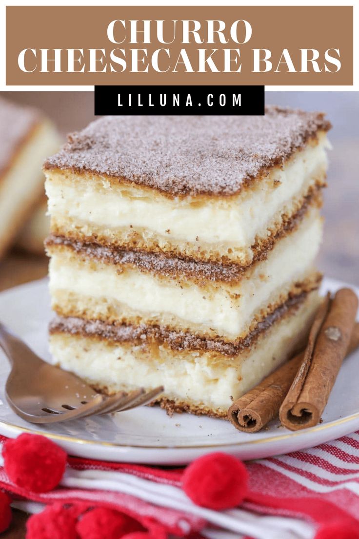 a stack of layered cheesecake bars on a plate with cinnamon sticks and powdered sugar