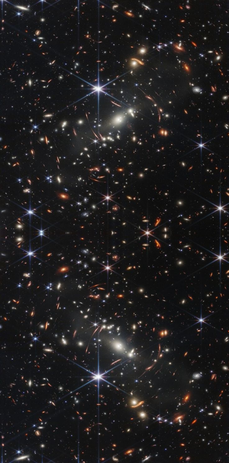 an image of many stars in the night sky with bright lights on them and dark background