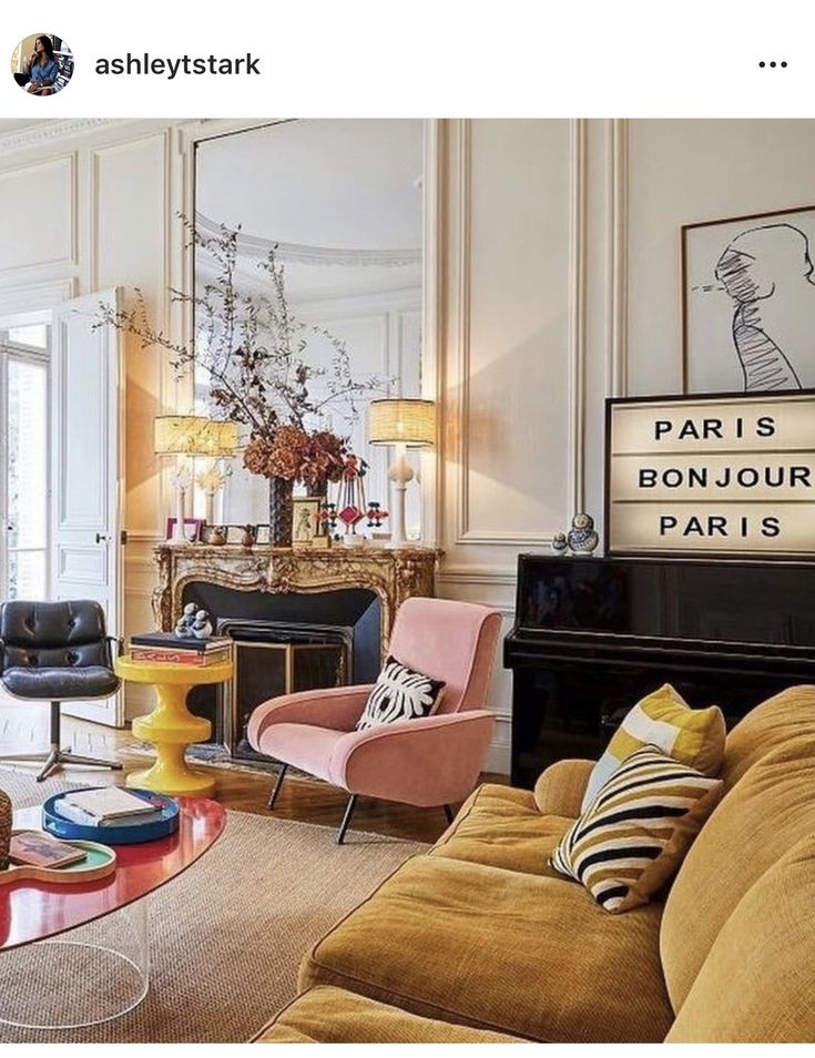 a living room filled with furniture and a piano