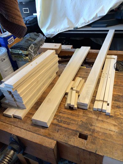 several pieces of wood sitting on top of a wooden table