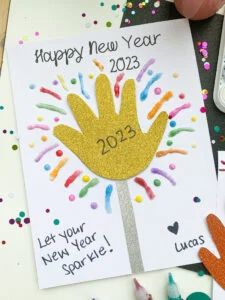 a handmade new year's card with confetti on it