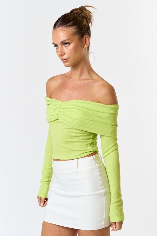 Long Sleeves Solid Ribbed Knit Off the Shoulder Ruched Detail 75% Polyester + 20% Rayon + 5% Spandex Model is wearing a size Small. Height 5'8" Bust 32A" Waist 24" Hips 34" Versatile Ruched Tops For Spring, Spring Ribbed Stretch Tops, Spring Ruched Fitted Tops, Ruched Fitted Top For Spring, Fitted Ruched Spring Tops, Stretch Ruched Tops For Fall, Casual Spring Knit Top, Spring Ribbed Elastane Tops, High Stretch Knit Top For Spring