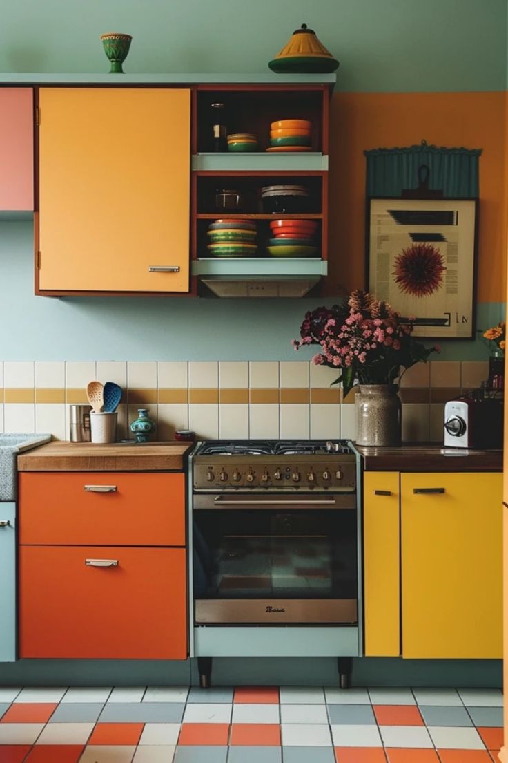 a kitchen with orange, yellow and blue cabinets and an oven in the middle of it