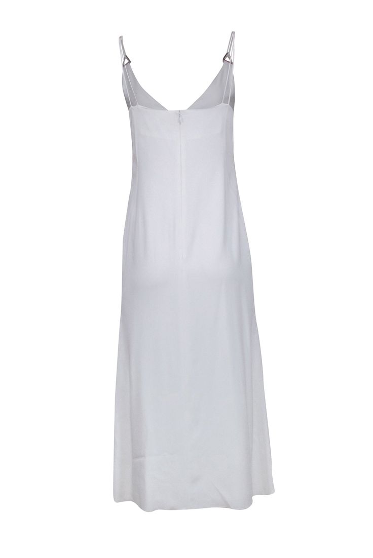 Indulge in effortless elegance with the Dion Lee’s slip dress. Its captivating allure combines summer whites and a timeless silhouette, making it the perfect ensemble for a romantic vacation dinner. With its graceful lines hugging your curves and a hint of playful allure in each step, this dress speaks for itself, all you need is simple jewelry and sandal heels! Size 4 Shell 76% Acetate, 21% Viscose, 3% Elastane Lining 100% Polyester Invisible zipper back Strappy sleeveless detail with triangle Vacation Dinner, Romantic Vacations, Sandal Heels, Dion Lee, Effortless Elegance, Simple Jewelry, White Summer, Hug You, A Romantic