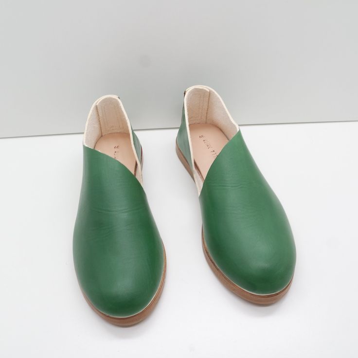 The Keiko is a translation of our most popular Sandy style to this much more casual roundtoe. A stitched back and roomy front, along with a rubberized sole make it a go to style for many occasions. This style features a removeable insert. The foam layer can be removed/replaced for a wider fitting shoe (we suggest to glue down the leather layer). Our new method of shoemaking has a double layer stitched back seam to provide heel structure without gripping the ankle. Made with our own olive leaf ta Olive Leaf, French Guiana, French Polynesia, Mongolia, Faroe Islands, Equatorial Guinea, Mauritius, Guinea Bissau, Mozambique