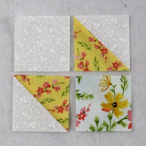 four pieces of fabric with flowers on them