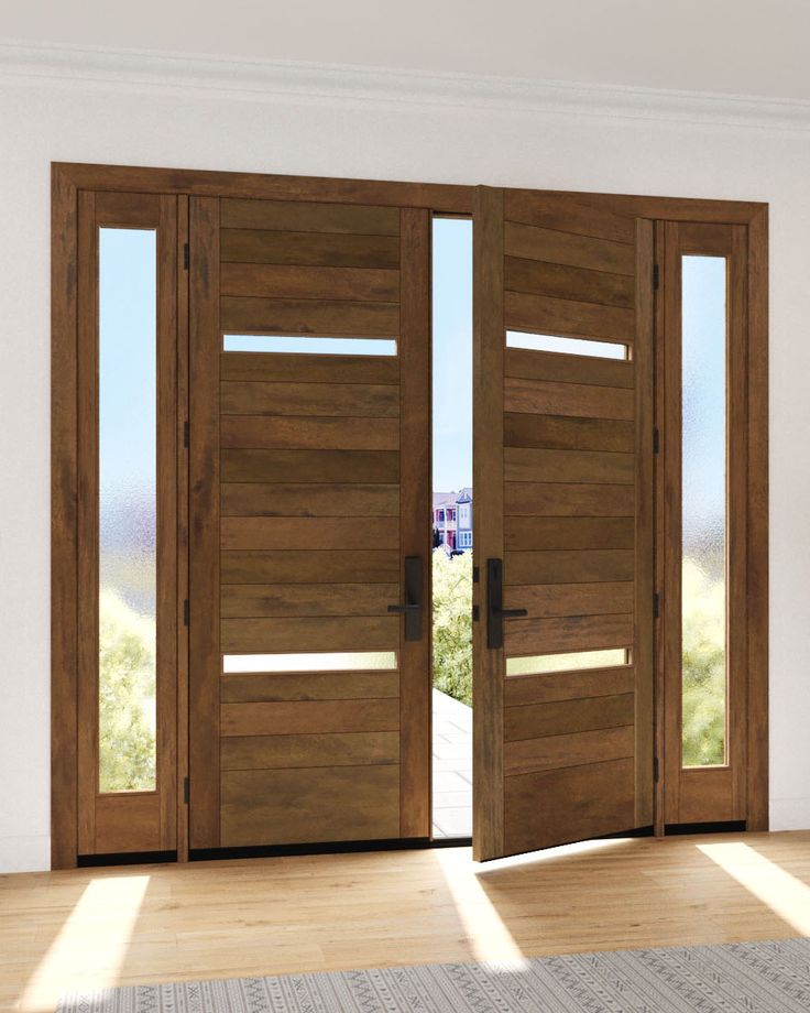 two wooden doors open in an empty room