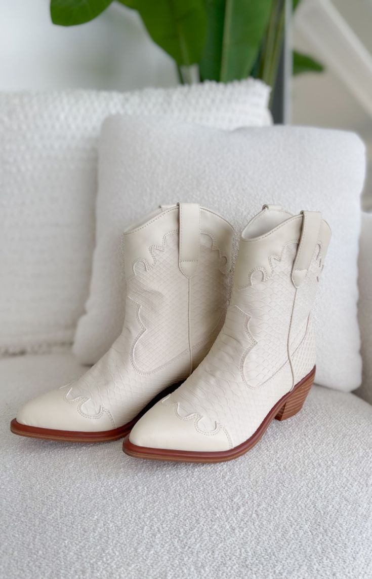 Whether you're stepping out for a day of shopping, heading to a country music concert, or simply looking to add a statement piece to your wardrobe, these boots are sure to turn heads wherever you go! Runs true to size Slip on style Color: Ivory Pointed toe 2.5" heel Patterns may vary Colors may vary from different viewing devices Country Music Concert, Country Music Concerts, Heels Patterns, Music Concert, Stepping Out, Color Ivory, Western Boots, Country Music, Slip On