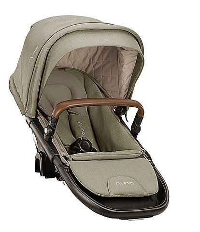 the baby stroller has a wooden handle on it's head and is light green