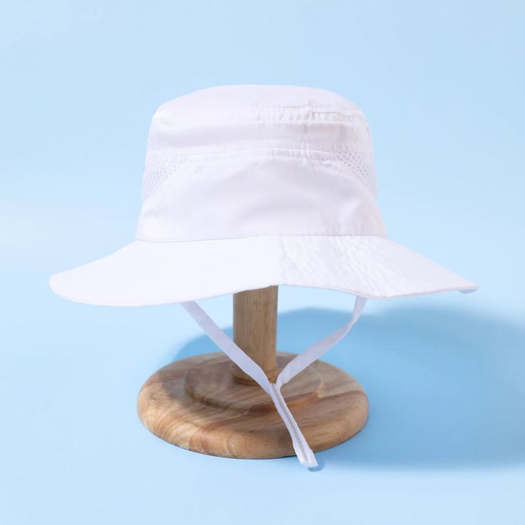 Kids Bucket Hat | Adjustable - Kids Hats - Poshinate Kiddos Baby & Kids Store - View of white hat with strap. Summer Lightweight Adjustable Bucket Hat, Playful Adjustable Hats With Upf 50+, Lightweight Adjustable Fit Summer Bucket Hat, Summer Hats With Uv Protection For Playtime, Summer Sun Hat With Uv Protection For Playtime, Playful Sun Hat With Uv Protection And Adjustable Fit, Spring Bucket Hat With Uv Protection And Adjustable Fit, Playful Adjustable Sun Hat With Uv Protection, Playful Sun Hat With Upf 50+ And Adjustable Fit