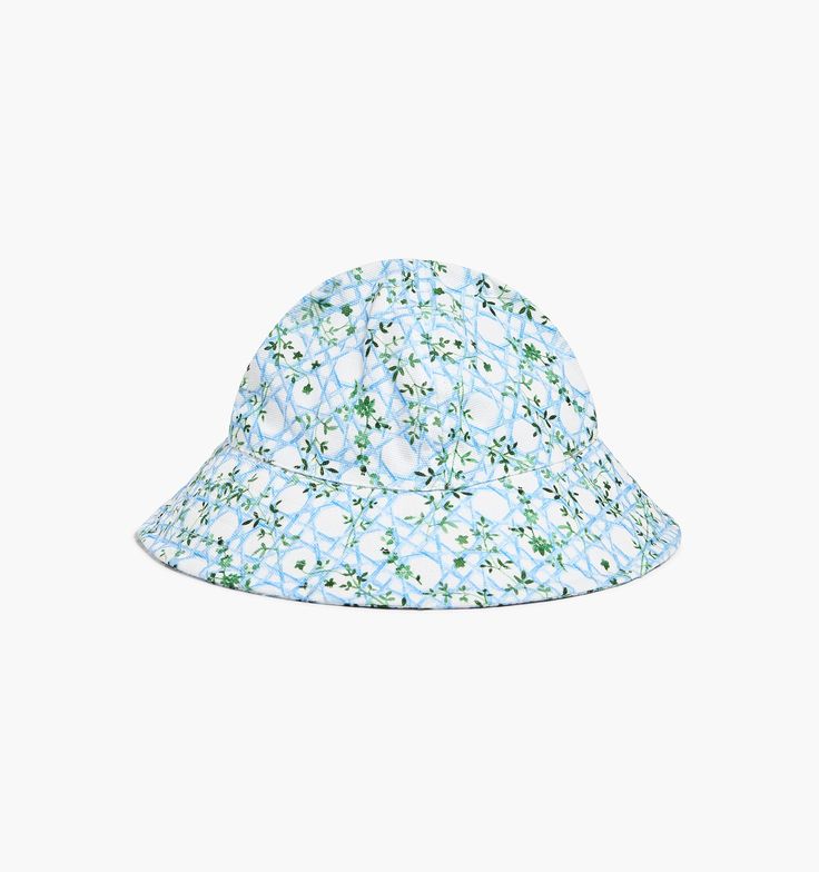 ​​The Baby Sunhat features a wide brim, UPF protection to shield your little one from the sun, and secure, velcro straps. For the complete look pair with the Vittoria Bubble + Bandana Bib. About the Print We worked with artist Leïla Dubus to create this watercolor print  inspired by Summer 2023’s best-selling basketweave print. This year’s Basketweave Vine also pulls inspiration from our classic Blue Botanical print to create a feminine, playful print perfect for every stage of summer. Adjustable Fit Hats For Playtime In Spring, Spring Bucket Hat With Uv Protection And Adjustable Fit, Spring Adjustable Fit Hat For Playtime, Green Sun Hat With Uv Protection And Adjustable Fit, Spring Adjustable Fit Sun Hat With Curved Brim, White Sun Hat With Curved Brim For Playtime, White Curved Brim Sun Hat For Playtime, Curved Brim Sun Hat With Uv Protection For Playtime, Spring Sun Hat With Adjustable Fit And Curved Brim