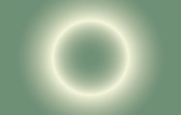 a white circle is shown in the middle of a green background with light coming from it