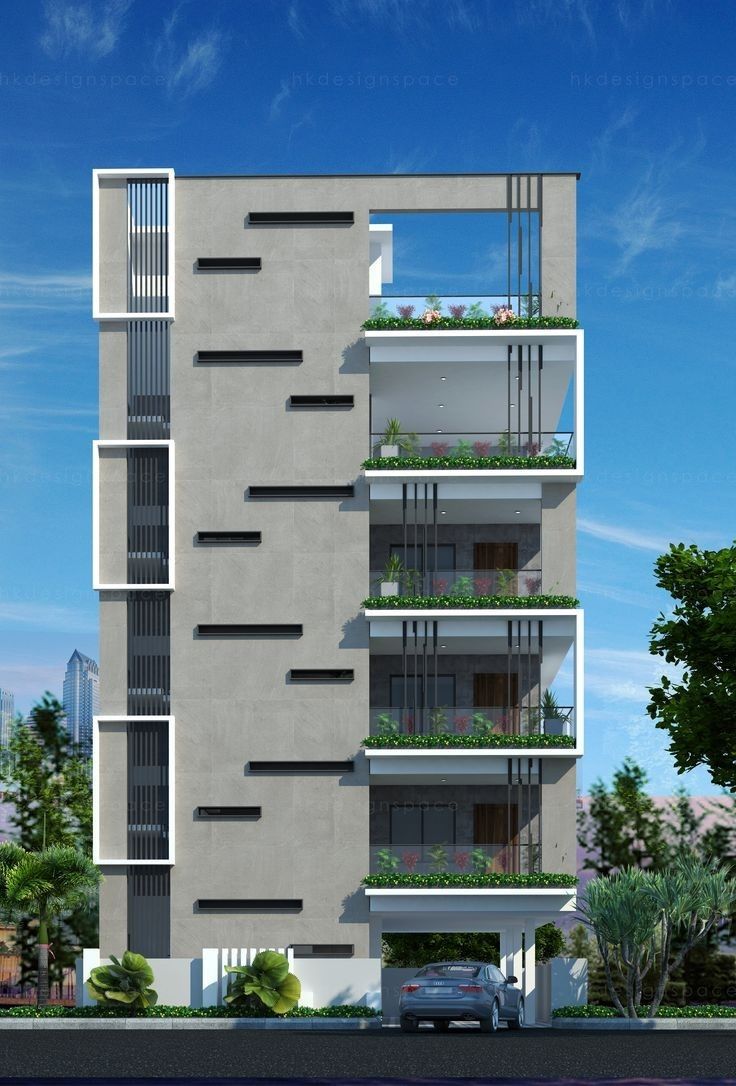 an apartment building with balconies and plants on the balcony