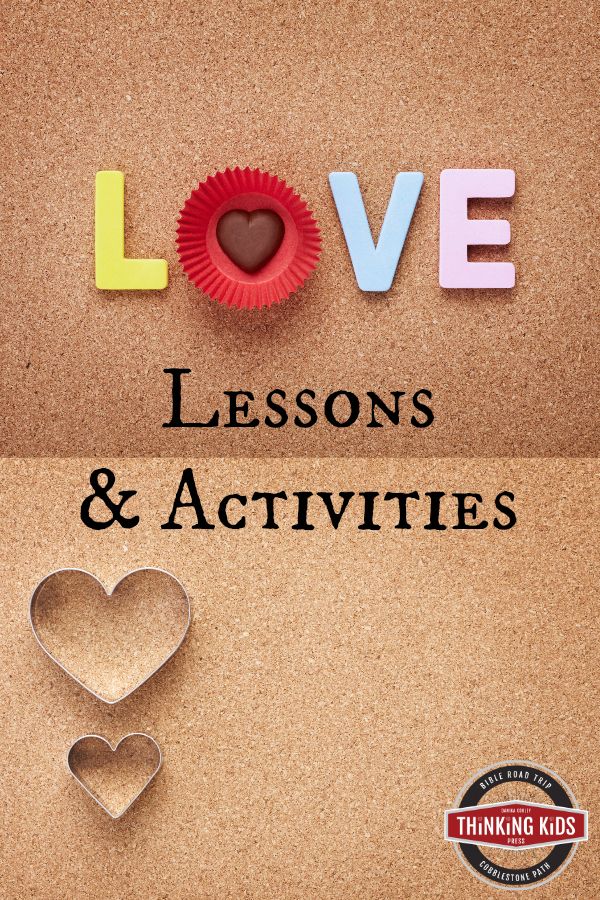 the words love, lessons and activities are cut out of paper on a bulletin board