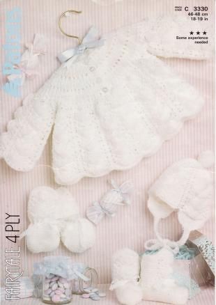 a crocheted baby's outfit and booties are shown in the package