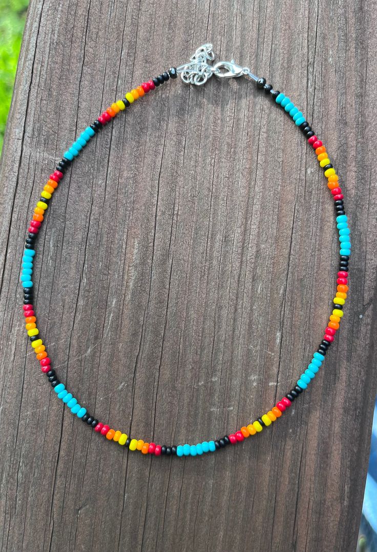 ☆ turquoise or purple or coral or neon green, black, white, red, orange, yellow ☆ lobster clasp and metal wire  ☆ sizes can be from 13in-16in and will have an extension chain ☆ beads are size 8/0  If you have any questions please DM me!! Southwestern Style Festival Choker With Colorful Beads, Southwestern Style Colorful Beaded Choker Necklace, Southwestern Beaded Choker For Festivals, Southwestern Orange Beaded Necklace, Western Chokers Beaded, Native American Necklace, Beaded Jewlery, Large Hoop Earrings, Seed Bead Jewelry