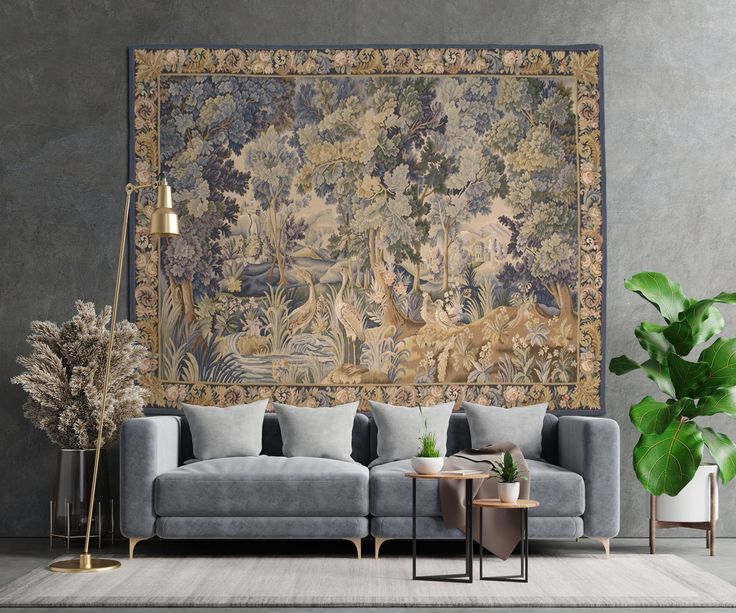 a living room with a large tapestry on the wall