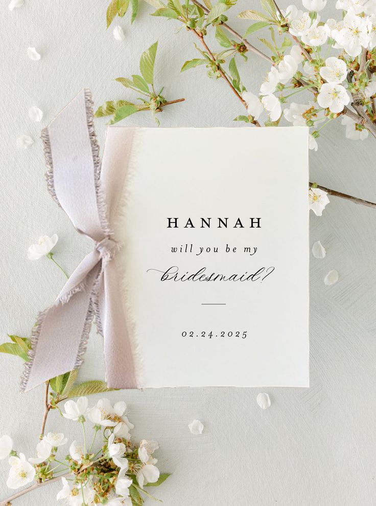 a card with the words hannah will you be my bridesmaid? on it