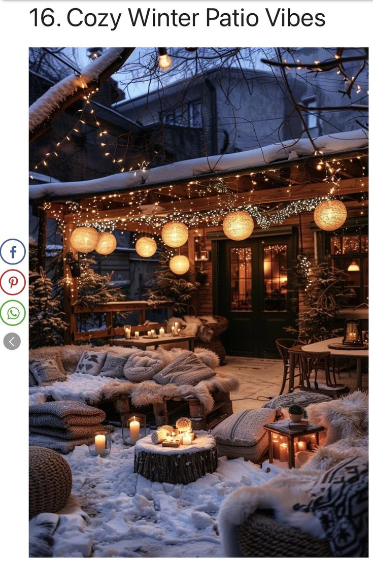 an outdoor patio covered in snow with lights