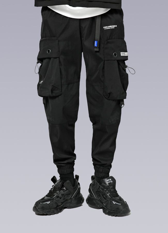 tech cargos Techwear Style Cargo Pants For Streetwear, Techwear Pants With Side Pockets, Functional Streetwear Cargo Pants With Multiple Pockets, Baggy Techwear Pants With Multiple Pockets, Functional Cargo Pants With Multiple Pockets For Streetwear, Baggy Techwear Pants With Cargo Pockets, Techwear Parachute Pants For Streetwear, Nylon Techwear Pants With Multiple Pockets, Nylon Techwear Bottoms With Functional Pockets