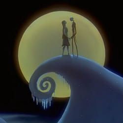 two people standing on top of a wave in front of a full moon with icing