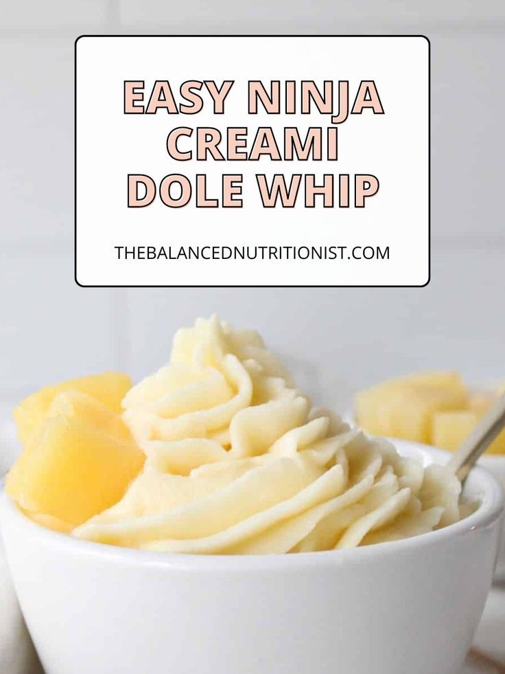 a white bowl filled with whipped cream next to sliced pineapples and the words easy ninja cream dole whip