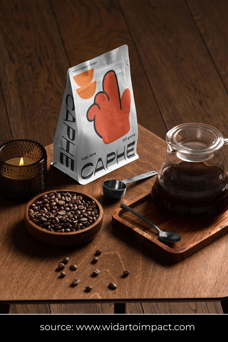 a wooden table topped with a bag of coffee