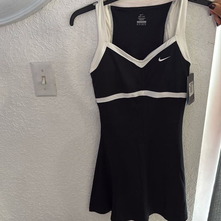 Nike Dress Black And White Size Xs New Casual Black Mini Tennis Dress, Casual Black Sleeveless Tennis Dress, Casual Black Tennis Dress, Nike Summer Dresses, Sporty Black Summer Dress, Casual Black Tennis Dress For Spring, Nike Casual Sleeveless Dress, Casual Nike Sleeveless Dress, Sporty Black Mini Dress