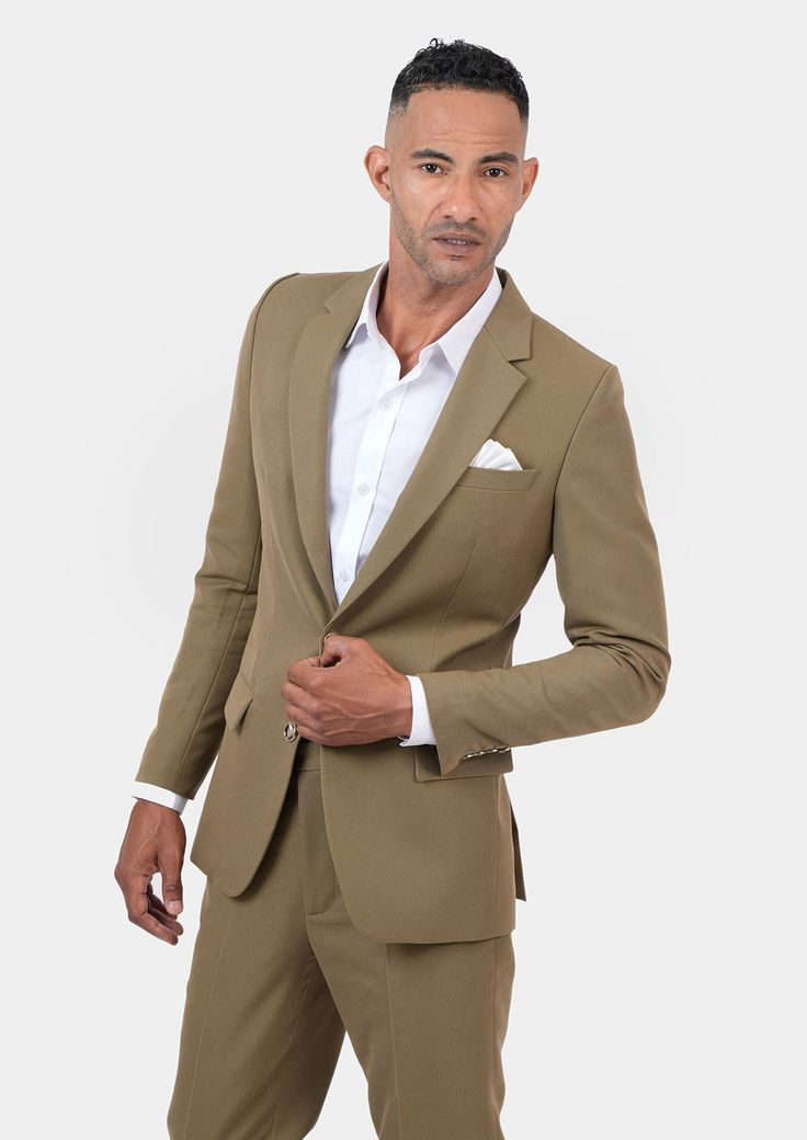 Jacket & pants included. Vest optional. Delivered in just 3 weeks. Free shipping. Covered by our Free Remake Guarantee. Complete the look with Shirts, Ties & Squares. Classic Khaki Blazer With Notch Lapel, Khaki Business Blazer With Welt Pockets, Fitted Khaki Suit For Work, Classic Khaki Blazer For Office, Luxury Cotton Suits With Notch Lapel, Classic Khaki Office Blazer, Classic Khaki Blazer For Business Casual, Elegant Khaki Blazer For Office, Formal Brown Cotton Sets