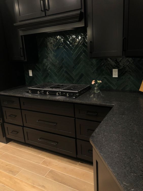 LUXURY DARK KITCHEN Black Cabinets With Dark Countertops, Moody Kitchen Tile Floor, Black Kitchen Cabinets Green Backsplash, Black Kitchen Tiles Backsplash Ideas, Black Cabinets Dark Countertops, Moody Kitchen Decor Ideas, Black Cabinets Green Backsplash, Dark Kitchen Theme, Moody Backsplash Tile