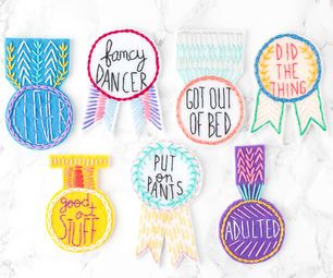 six embroidered badges with the words fancy dancer, got out of bed, put on pants, and do the thing