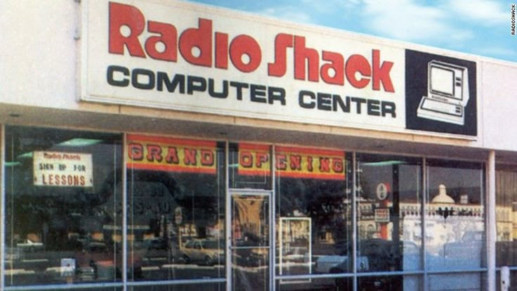 the radio shack computer center is located on the side of the street in front of it's storefront