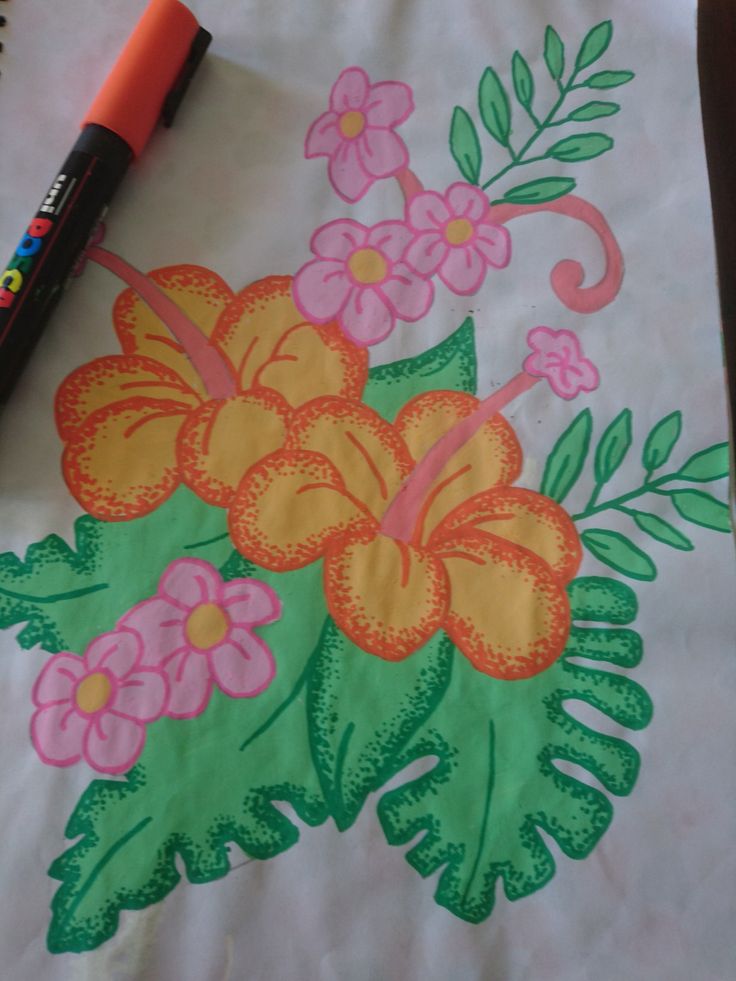 a drawing with flowers and leaves on it next to a marker pen, pencil and paper towel