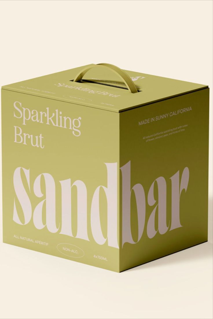 a green box with the words sandbar printed on it, sitting in front of a white background