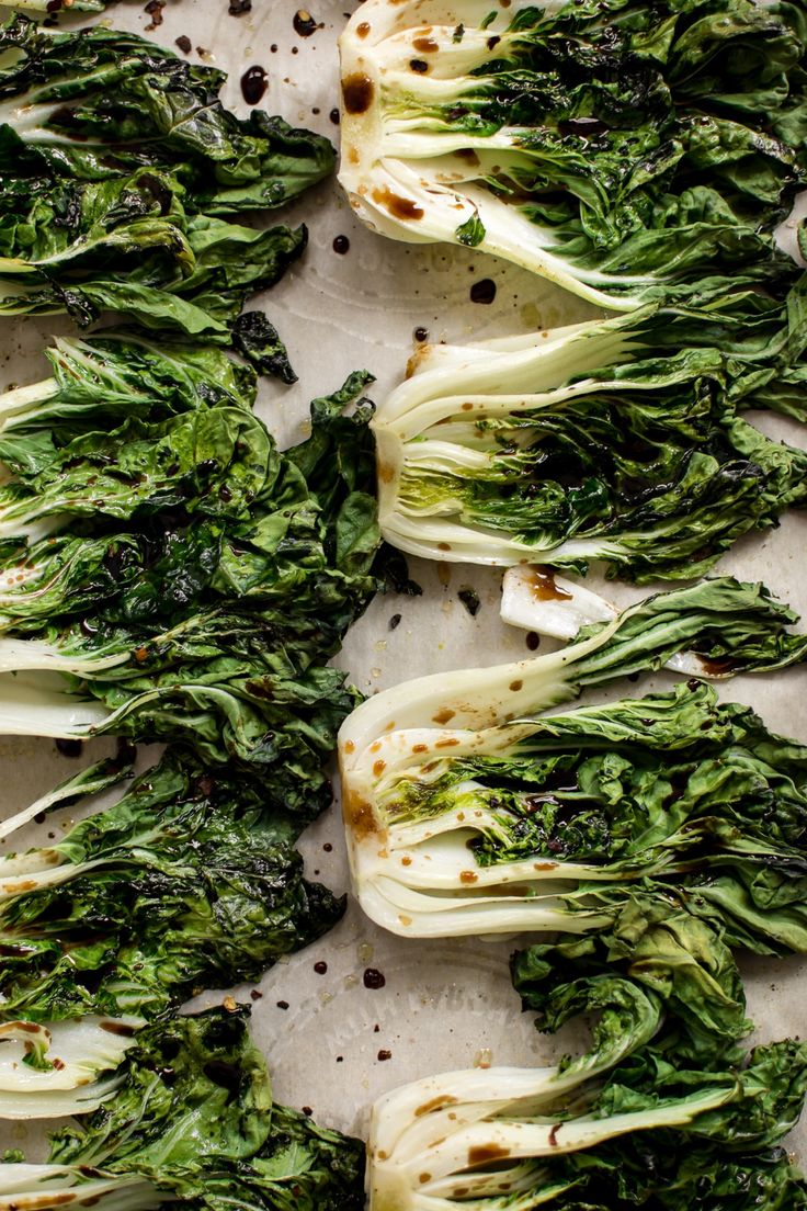 broccoli florets on a baking sheet ready to be cooked