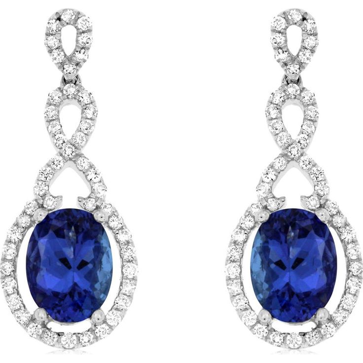 Royal Enchantment: 14K White Gold Tanzanite & Diamond Earrings Formal Oval Tanzanite Earrings, Elegant Oval Bridal Earrings For Formal Occasions, Oval Diamond Earrings With Elegant Design For Formal Occasions, Elegant Oval Diamond Earrings With Gemstones, Elegant Oval Diamond Earrings For Formal Occasions, Elegant Tanzanite Formal Earrings, Elegant Tanzanite Dangle Earrings, Elegant Tanzanite Earrings For Formal Occasions, Elegant Oval Halo Earrings