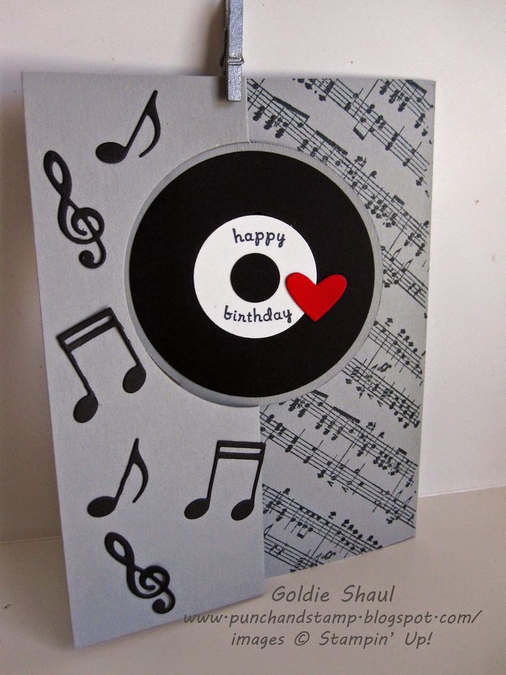 a happy birthday card with music notes and a record