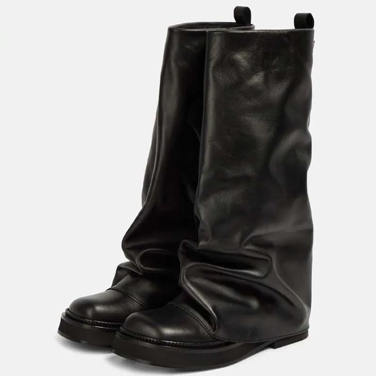 Introducing the Sleek Modern Mid-Calf Leather Slouch Boots, a must-have addition to any fashion-conscious wardrobe for Autumn, Spring, and Winter. The boots feature a distinctive square toe that adds a contemporary edge to the classic Western style. Constructed with a durable rubber outsole and a plush microfiber lining, these boots offer both resilience and luxurious comfort. The boots are distinguished by a solid pattern, exuding an understated elegance that complements a variety of outfits. A unique button closure provides both a secure fit and a stylish detail. The mid-calf height strikes a perfect balance between coverage and chic appeal, while the PU upper material ensures a sleek finish and long-lasting wear. Function meets fashion with features such as anti-odor technology for fres Cool Winter Boots, Saggy Boots, Winter Boots 2024, Womens Boots For Fall, Winter Shoes 2024, Winter Shoes Outfit, Winter Shoes Aesthetic, Layered Boots, Slouch Boots Outfit