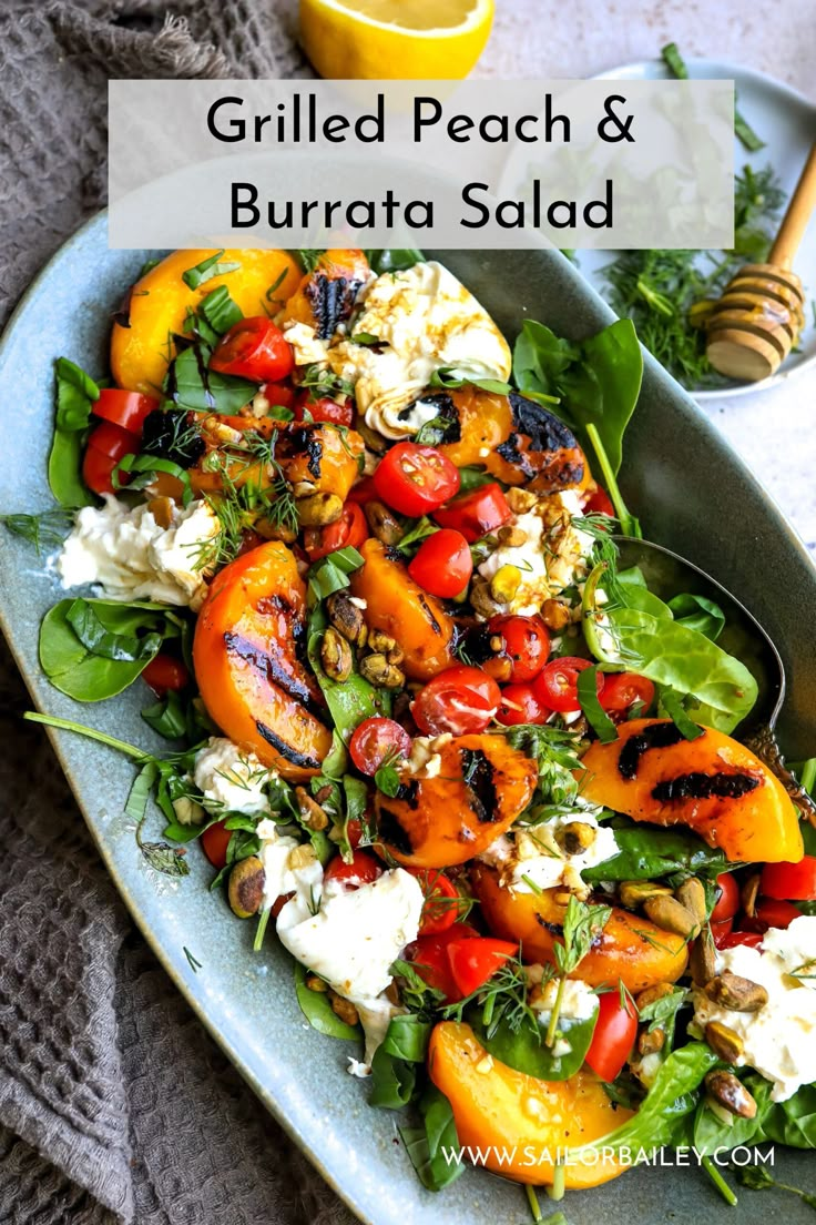 grilled peach and burrata salad on a blue plate