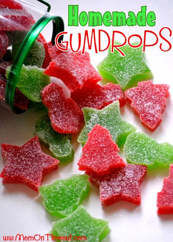 a pile of gummy stars sitting on top of a white table