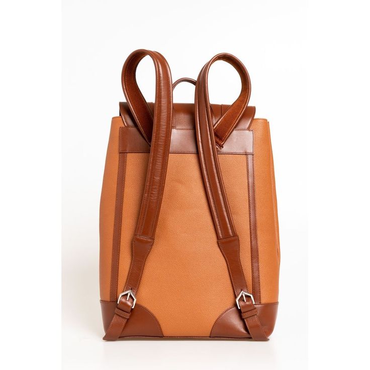 Indulge in the epitome of Italian luxury with this exquisite Trussardi leather backpack. Crafted to perfection, it boasts a sleek design with a magnetic button closure, ensuring your essentials are secure yet easily accessible. The front logo subtly proclaims your taste for high-end fashion, while the practical internal compartments keep you organized on the move. A sophisticated Brown hue complements a range of styles, from smart-casual to formal. Material: 100% Leather Country of origin: IT Co Leather Backpack For Men, Men Backpack, Brown Backpacks, Brown Leather Backpack, Men's Backpack, Modern Man, Leather Accessories, Satchel Bags, Belt Bag