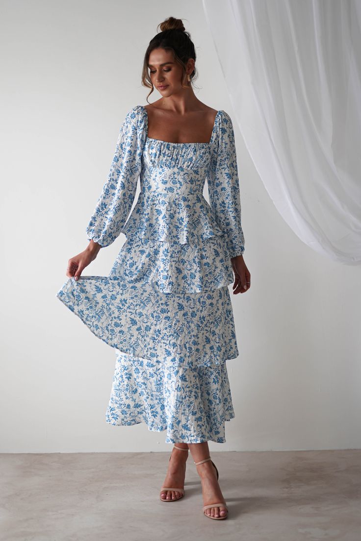 Highlights Gorgeous summer print maxi dress Stunning ruffle detail Beautiful off-the-shoulder balloon sleeves Sizing The model is 5'10 and wears UK size 8 / S / US size 4 Fit & Fabric Made from 90% Polyester & 10% Spandex Rear zipper True to size Length from top of shoulder to hem: 133cm Sleeve Length: 64cm Stretch: 6/10 Perfect for Wedding Guests Summer Events 70s Garden, Long Sleeve Blue Dress, Shower Dress For Bride, Sunday Dresses, Pictures Outfits, Sky Blue Dress, Cute Maxi Dress, Church Fits, Blue Floral Midi Dress