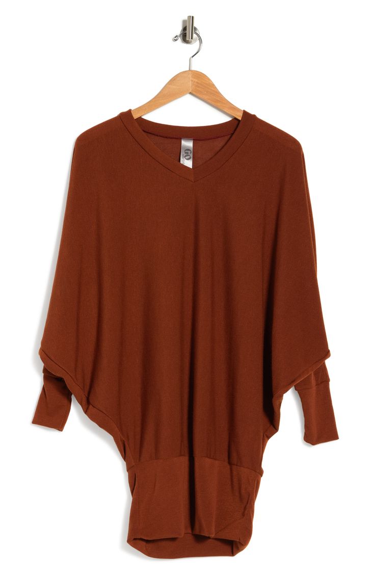 A cozy knit construction completes this fall-ready dolman sleeve tunic sweater. V-neck Long dolman sleeves Knit construction Tunic length 47% rayon, 47% polyester, 6% spandex Machine wash, dry flat Imported Model stats: 5'10", Bust: 32", Waist: 25", Hip: 36". Model is wearing size S. Cozy Knit, Tunic Length, Tunic Sweater, Cozy Knits, Dolman Sleeve, Nordstrom Rack, Rust, Nordstrom, Spandex