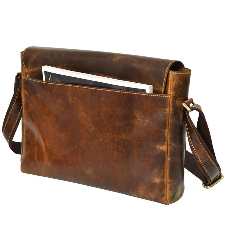 This brown satchel messenger bag, made from genuine leather, combines vintage charm with modern functionality. With ample space and an adjustable strap, it's a stylish and durable companion for any adventure. Brown Satchel Saddle Bag For Travel, Classic Brown Laptop Bag With Flap, Distressed Brown Leather-lined Satchel Shoulder Bag, Vintage Brown Flap Bag For Travel, Vintage Leather Crossbody Laptop Bag, Vintage Brown Rectangular Saddle Bag With Adjustable Strap, Distressed Brown Waxed Finish Shoulder Bag, Distressed Brown Satchel For Travel, Brown Shoulder Laptop Bag With Detachable Strap