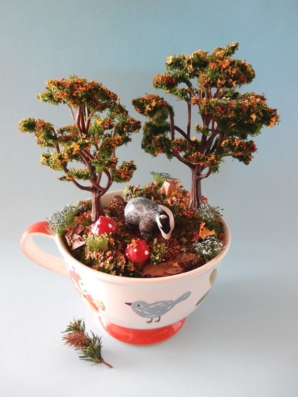 there is a small pot with trees in it