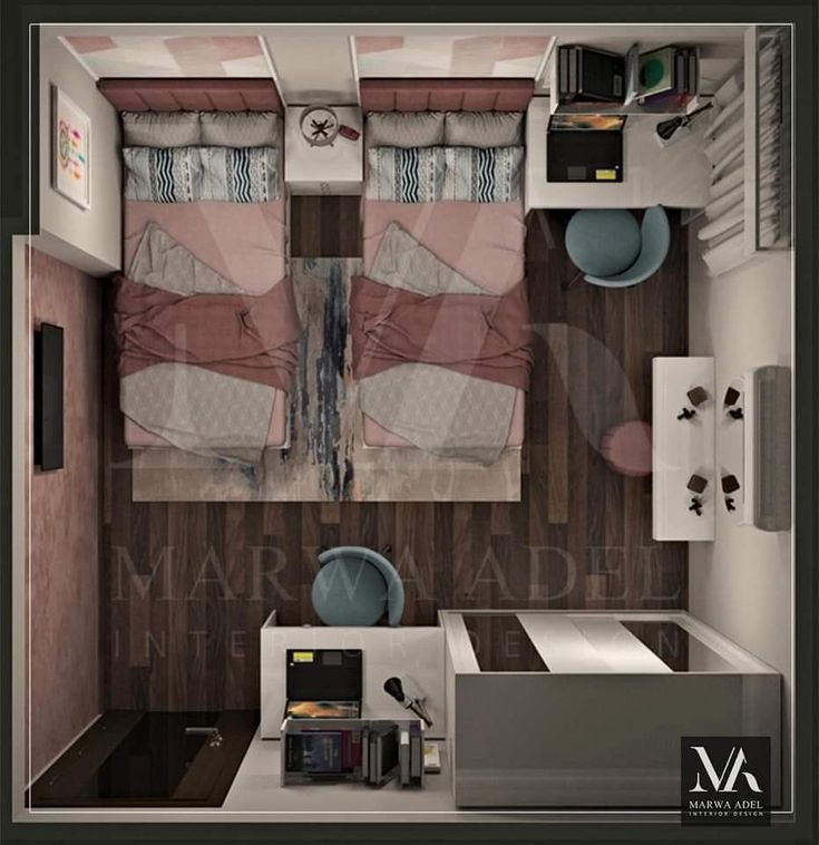 an overhead view of a small bedroom with two beds and a microwave in the corner