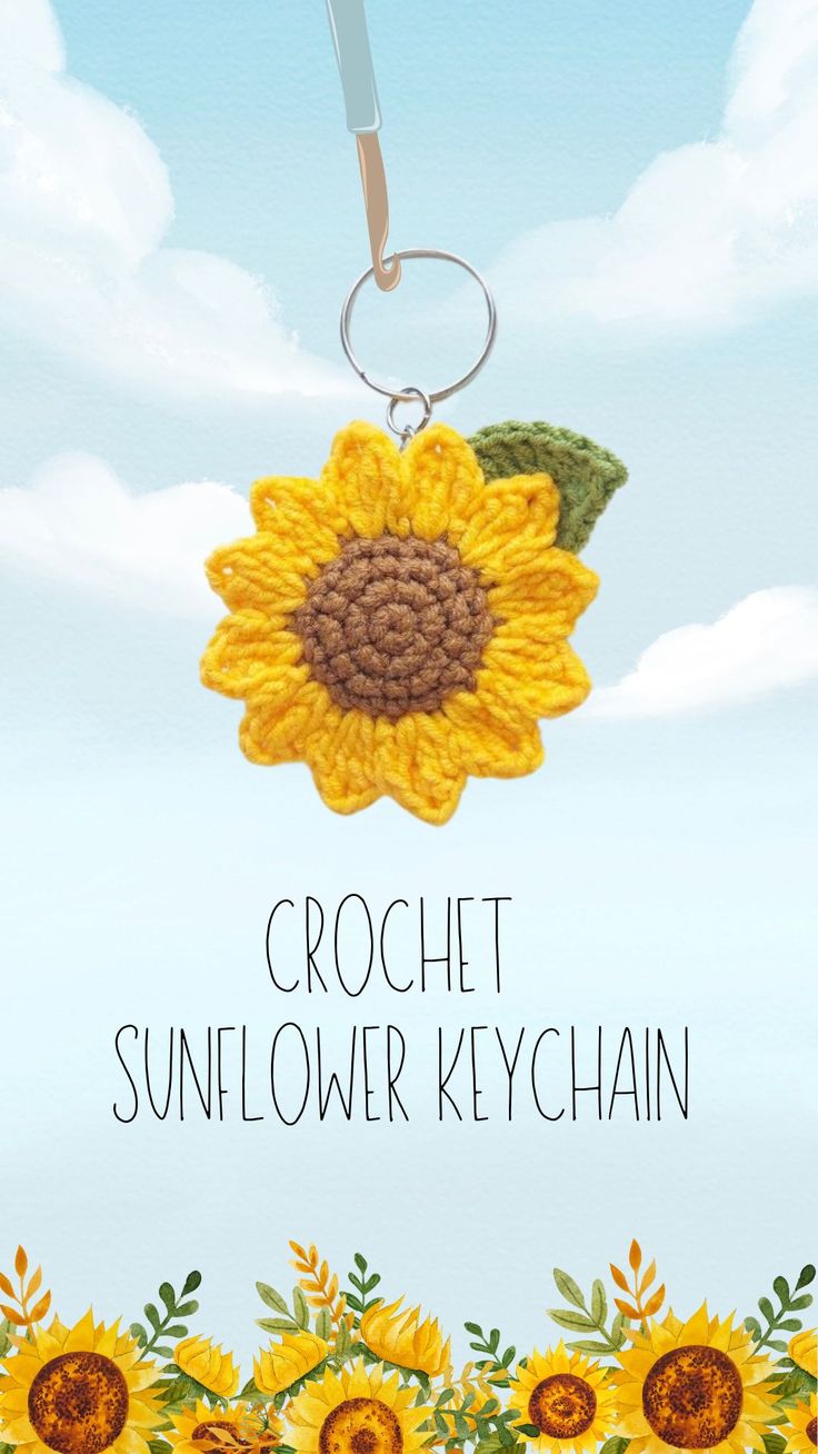 a crochet sunflower keychain hanging from a hook with the words crochet sunflower keychain on it